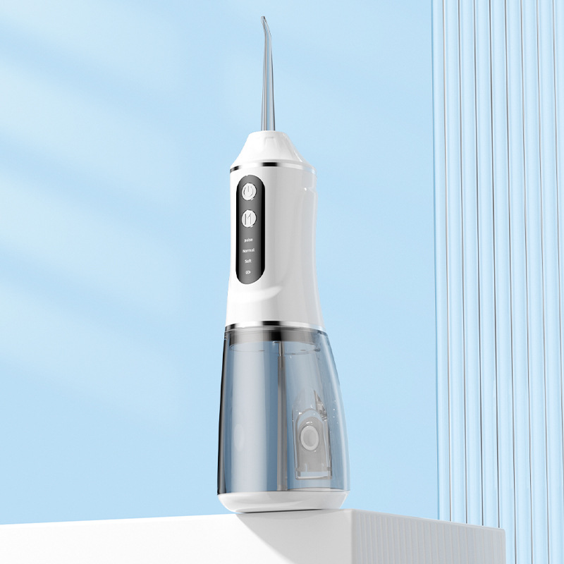 White Portable Electric Oral Irrigator with 4 Nozzles and 3 Pressure Modes